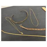 Group of necklaces maybe brass with bracelet