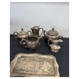 Group of silver plated cream, sugar, and tray