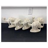 Five unpainted ceramic bisque nativity camels.  2
