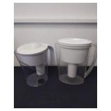 Two Brita filter pitchers