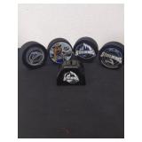 NHL Idaho Steelhead Hockey pucks and a cow bell