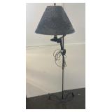 black metal floor lamp with a pierced-tin style