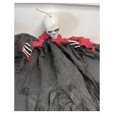 Skeleton with red and black cape, Halloween decor