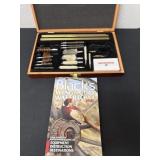 Gun cleaning kit with book