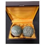 pair of green stone Baoding balls