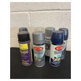 Sprays paints cans half full
