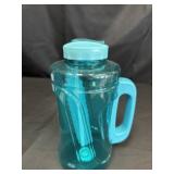 Large turquoise plastic water bottle