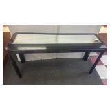black console table with a mirrored top very nice