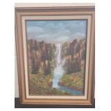 Framed canvas art signed L Thompson