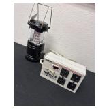 LED lantern with surge suppressor