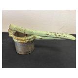 vintage metal potato ricer