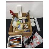 Box of sewing items, scissors, light, pens, and