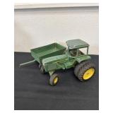 Vintage metal John Deere tractor with tailer ertl