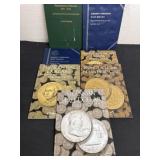 7 empty coin collector booklets
