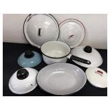 Group of enamel lids with one pot