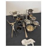 Group of cream and sugar, napkin, rings and more