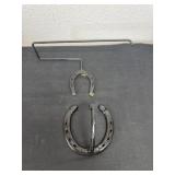 Horseshoe hook with horseshoe paper towel holder