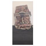 Adventure camouflaged backpack Some ware