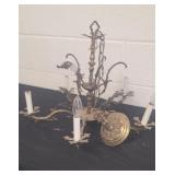 Antique chandelier has broken piece
