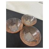 Three 7ï¿½ a vintage pink glass bowl with a raised