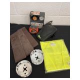 Group of tools and tape measure and vest