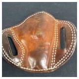brown, handcrafted leather pancake-style