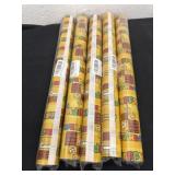 Five rolls of Mario wrapping paper