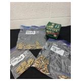 Shot gun shells and 223 ammo and brass 40 s&w