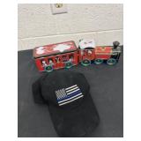 Metal tin train with police hat