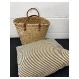 Vintage feather pillow with wicker basket