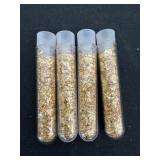 Four 2.5ï¿½ vials of gold flakes
