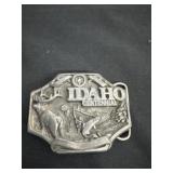 a vintage Idaho Centennial Belt Buckle cast in