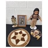 Group of native items, leather placemat with skull