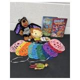 Scooby Doo DVDs with two plushyï¿½s and skull