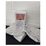2 bath mats with the tissue box