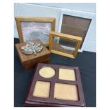 Two wooden boxes with picture frames
