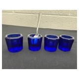 Four 1.5ï¿½ blue glass Dappen dishes one has small