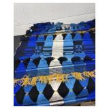 4ï¿½ vibrant, hand-woven blue, black, white, and