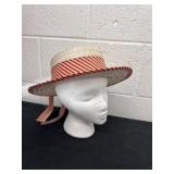 vintage straw boater hat with a red and white