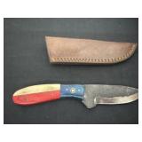 4ï¿½ fixed-blade knife and a leather sheath