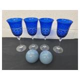 4 vibrant blue crystal wine goblets with shakers