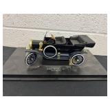 vintage die-cast display model of a 1910 Ford