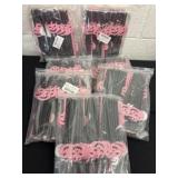 Group of new pink and black pumpkin paper straws