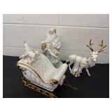 3 ceramic Santa sleigh and reindeer