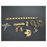 Group of pins, earrings, and bracelet
