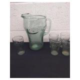 Coca-Cola picture and five glasses four are