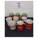9 Coca-Cola mugs