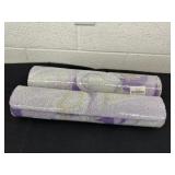 2 purple floral bath mats