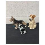 3 dog figurines