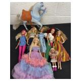 Group of Barbie dolls